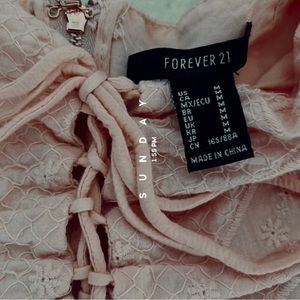 Pink frilly tie up forever 21 crop top.